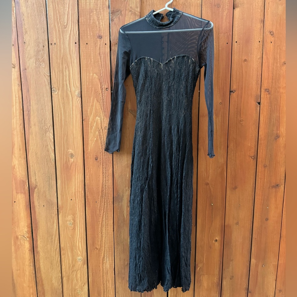 Peep vintage black lace gown with mesh sleeves